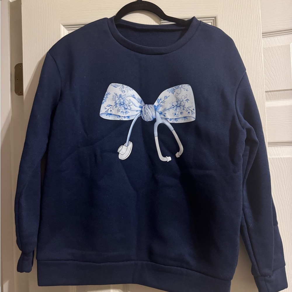 Navy Sweatshirt with Blue and White Bow Design
